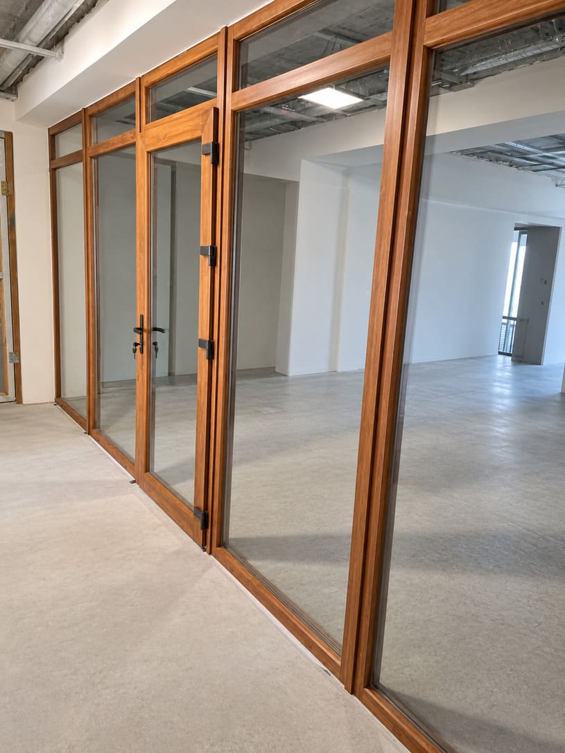 Custom-made office partitions built to exact survey dimensions